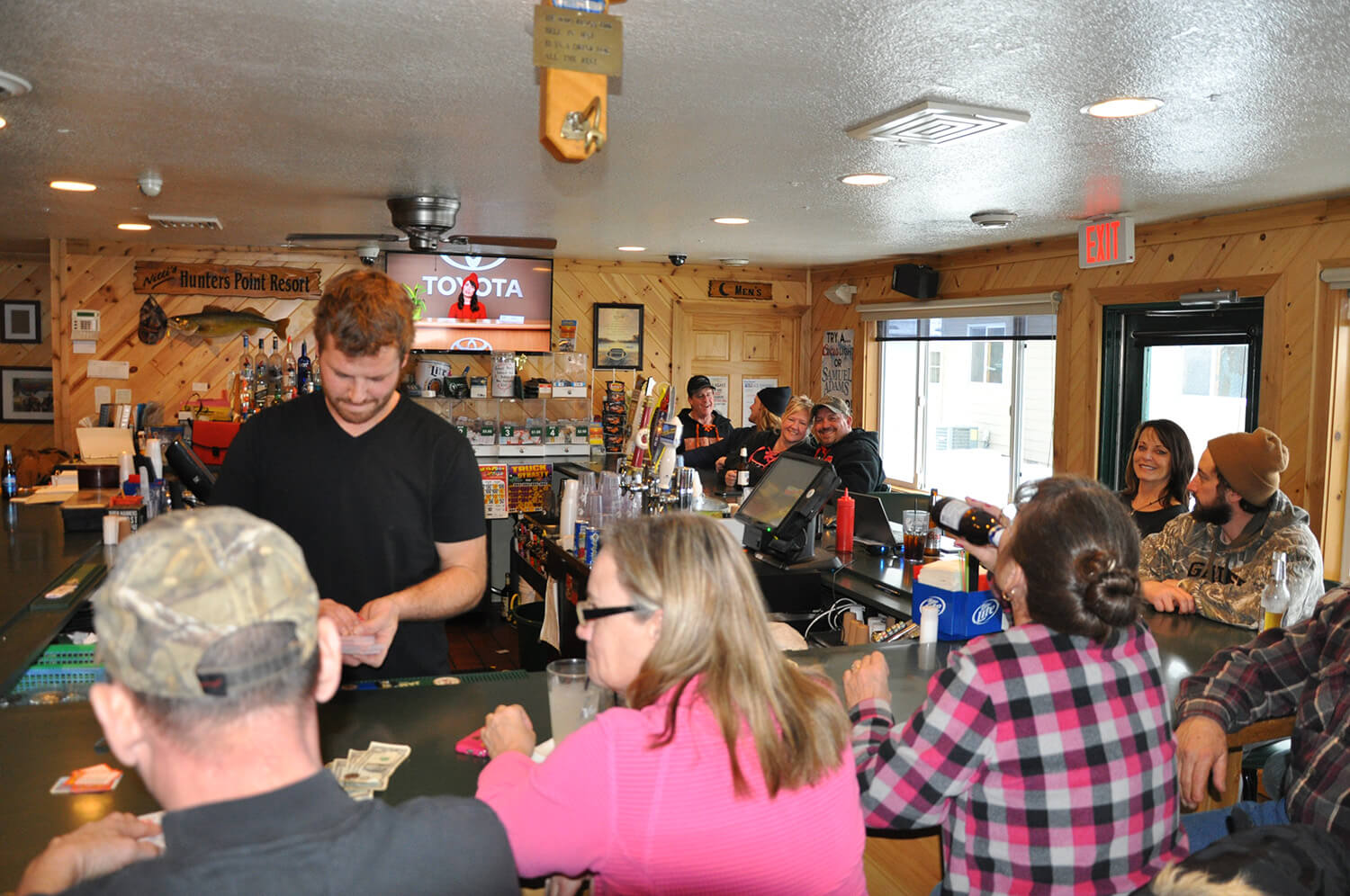 people at hunters point resort bar